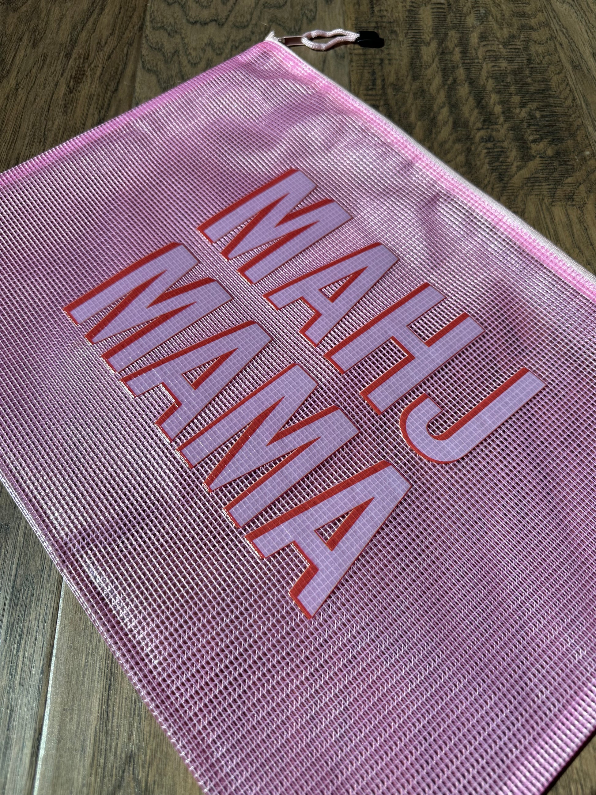Mahj Mama tile bag in pink mesh — fun mahjong tile storage bag with bold embroidered logo