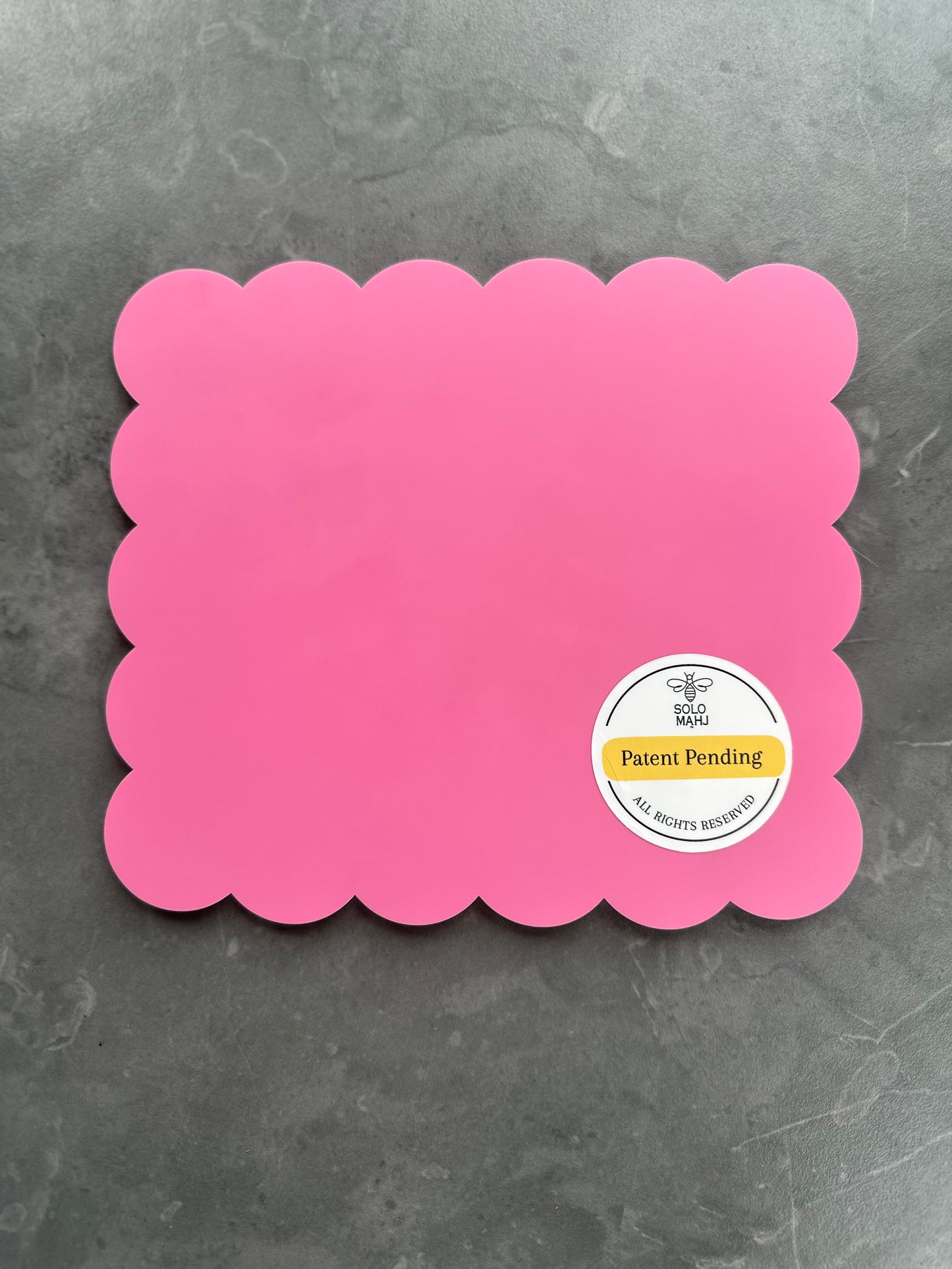 Back of Mahj Mood X SOLOMAHJ Clover small tile mahjong practice board in pink with scalloped edges and patent pending label