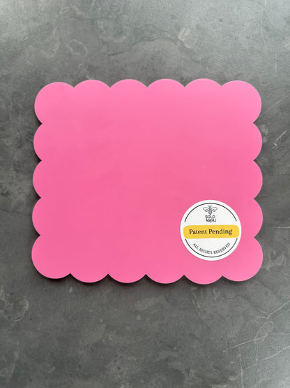 Back of Mahj Mood X SOLOMAHJ Clover small tile mahjong practice board in pink with scalloped edges and patent pending label