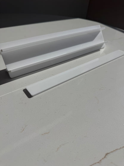Mahj Mood white acrylic travel mahjong racks close-up — compact rack pieces stacked showing slim profile