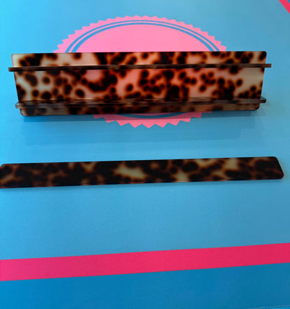 Mahj Mood tortoiseshell travel mahjong rack assembled — two rack pieces joined showing how racks connect for play