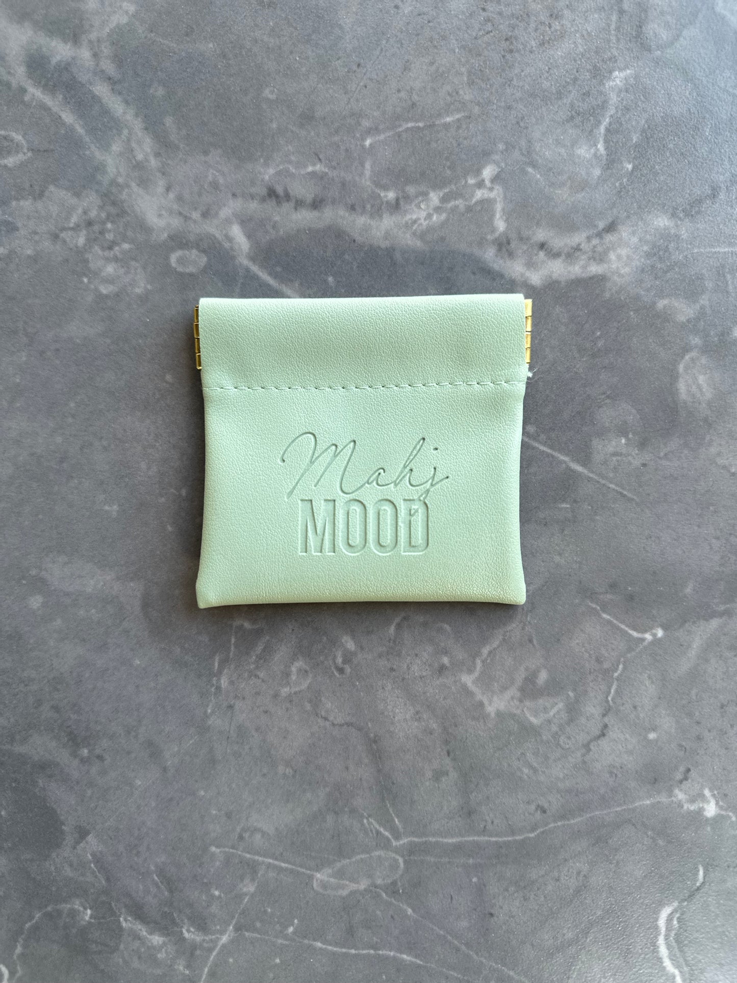 Mahj Mood dice bag top view — mint green faux leather mahjong pouch with magnetic snap closure