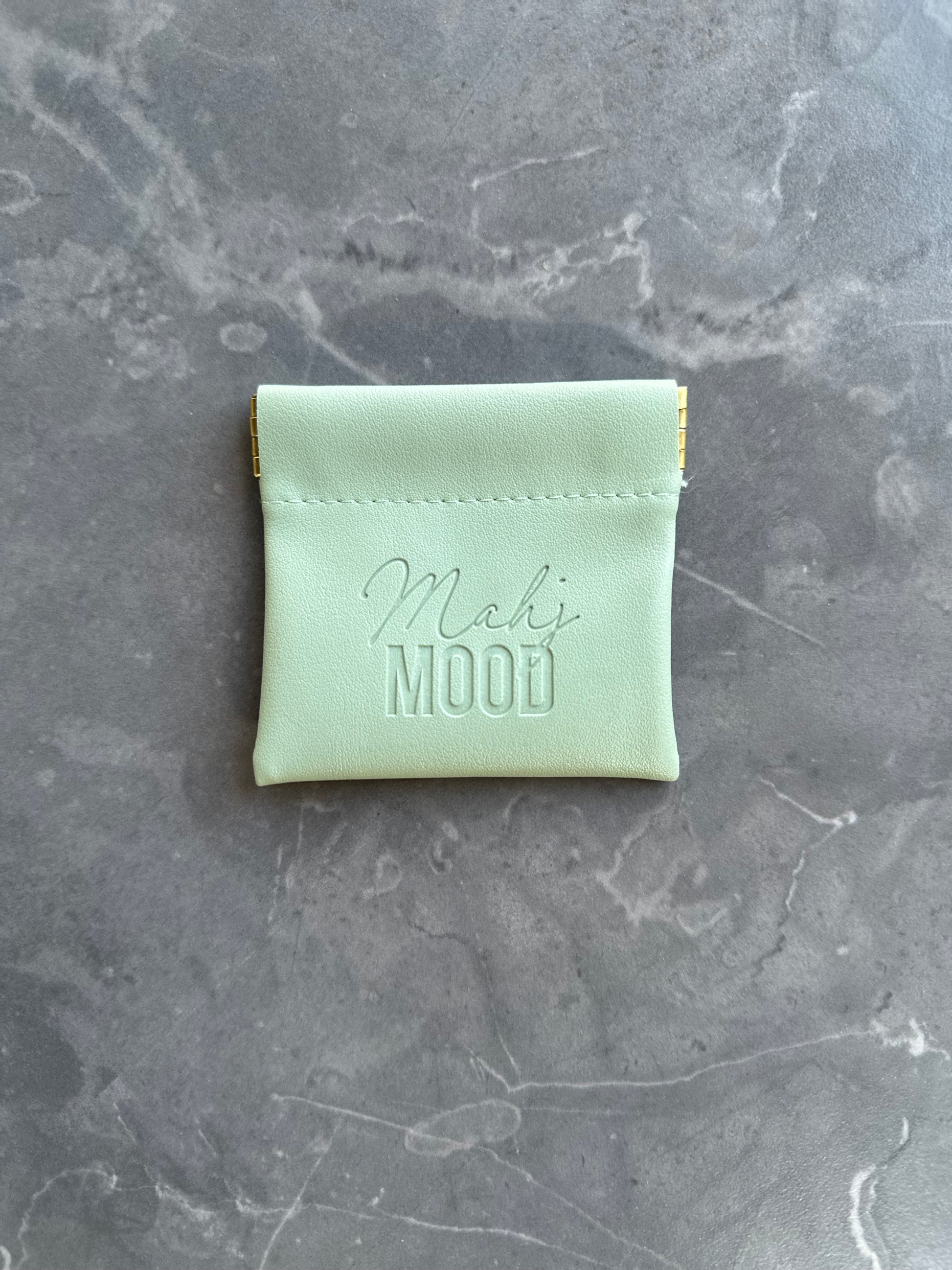 Mahj Mood dice bag top view — mint green faux leather mahjong pouch with magnetic snap closure
